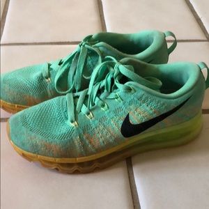 Women’s mint green Nike sneakers